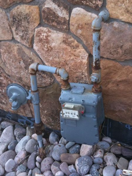 Wildridge Colorado Natural Gas Whole House Installation
This application shows a GMX Natural Gas installation treating the whole house from just downstream of the gas meter on a home in Wildridge CO.

The home has 8 appliances. 3 furnaces, 2 water heaters, 2 gas logs, and a stove cook top. With a total Gas BTU load of around 450,000 input.

We re-piped downstream of the meter, using 1 1/4" Stainless Steel Track Pipe. Allowing for 5 Model 848 GMX Units. 
And have found that the Stainless Steel Track or Gas Tite pipe works well.

Just after the installation the homeowner noticed that the range burners were now lighting without having to use a match. 
The home is located at an elevation of around 8,000 feet and has had challenges with the burners lighting properly.

We will be in communication when the time comes to compare her previous Natural Gas usage reports.

Others that we have been installing over the last year or so are beginning to come in.  We are excited with the feedback we have received so far.
